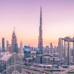 Panorama Dubaju o zachodzie słońca z Burdż Chalifą. Marzysz o zwiedzaniu? Sprawdź burdż chalifa bilety!